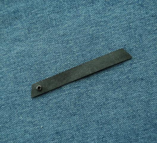 custom leather label with metal eyelet